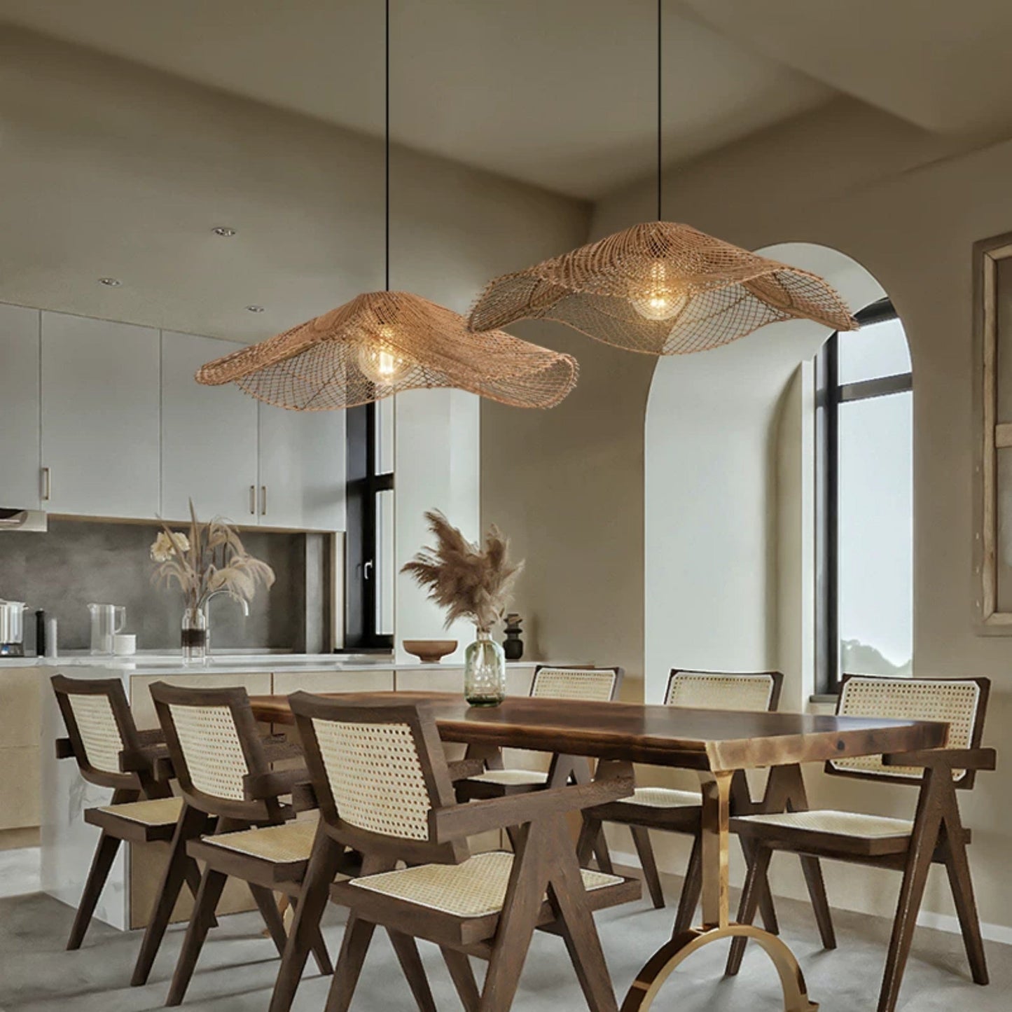 Sculptural woven net bamboo chandelier featuring a lightweight, see-through mesh structure that creates beautiful soft shadows.