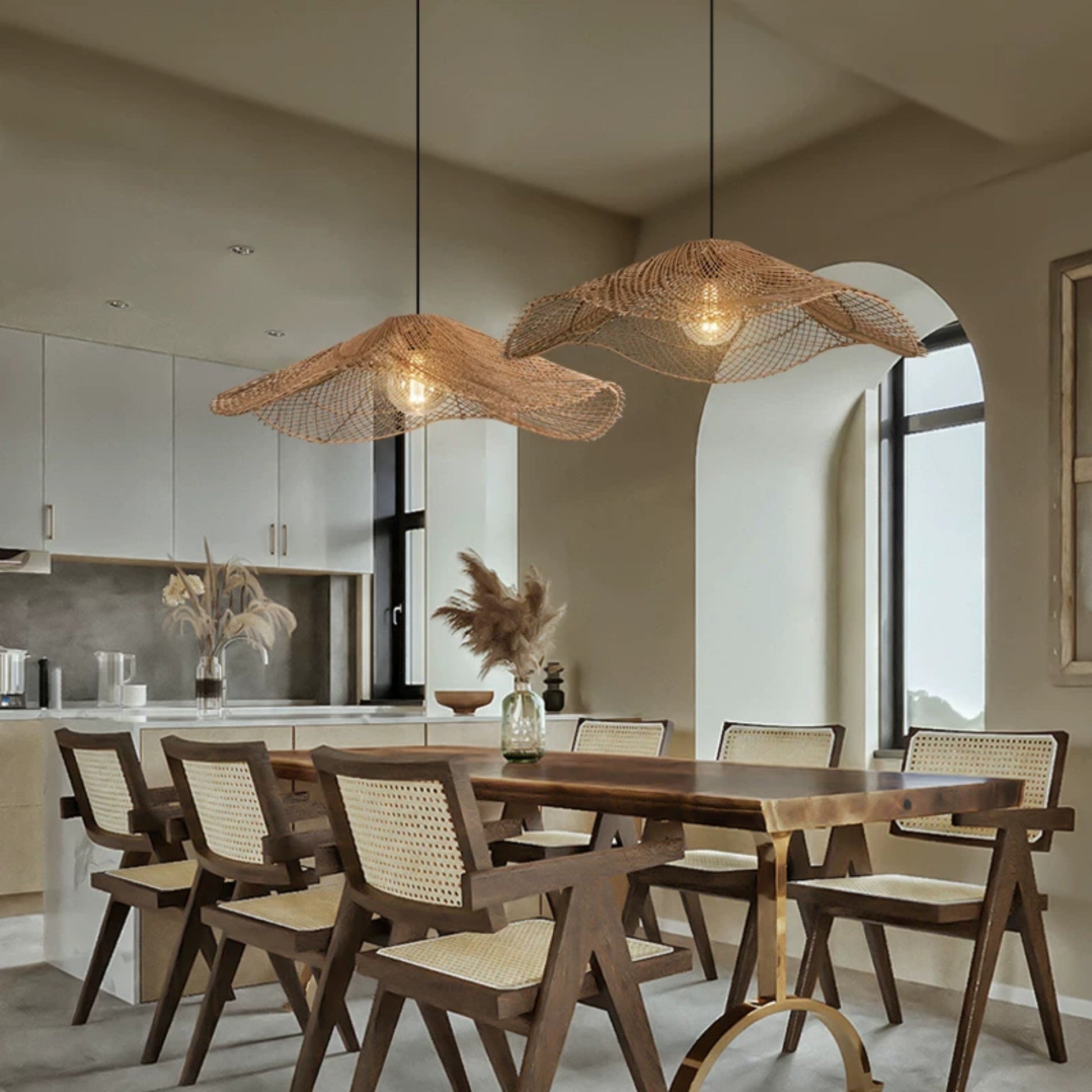 Sculptural woven net bamboo chandelier featuring a lightweight, see-through mesh structure that creates beautiful soft shadows.