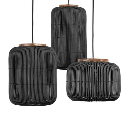 Contemporary wicker cage chandelier with light glowing from within a natural reed handwoven frame.