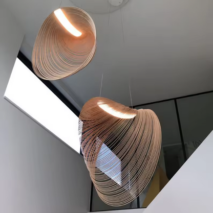 Modern abstract wave light fixture providing artistic ceiling decor