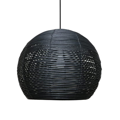 Two modern black rattan basket pendant lamps hanging over a white kitchen island