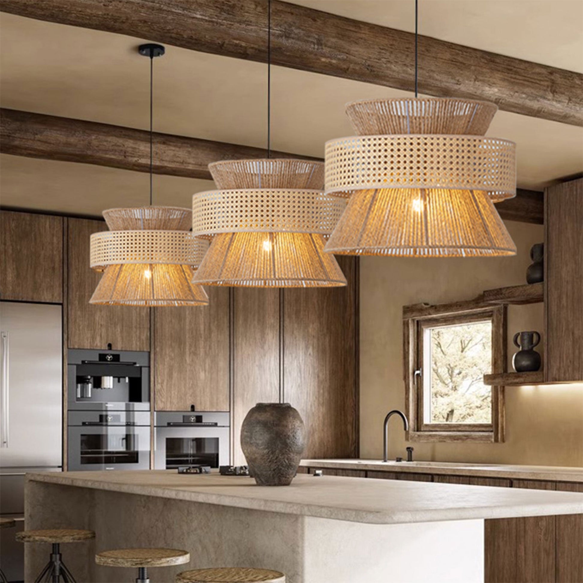 Premium linear wicker chandelier setup featuring three warm-lit textured shades hanging over a modern rustic countertop