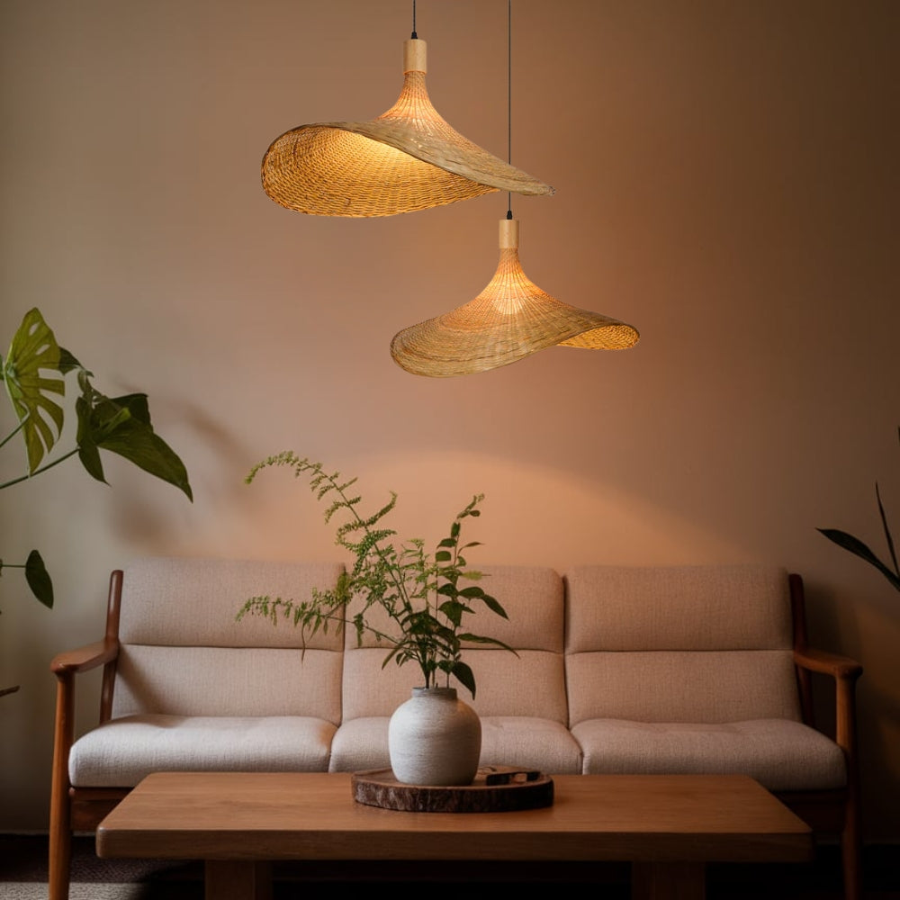 Modern wicker chandelier casting soft ambient light over a cozy dining setup with warm wooden furniture
