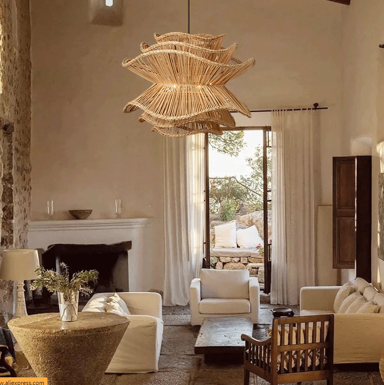 Tiered flower-shaped natural rattan pendant lamp hanging from a black cord for minimalist interior design.