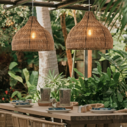 Modern natural rattan ceiling light illuminating a stylish bar counter in a luxury resort.