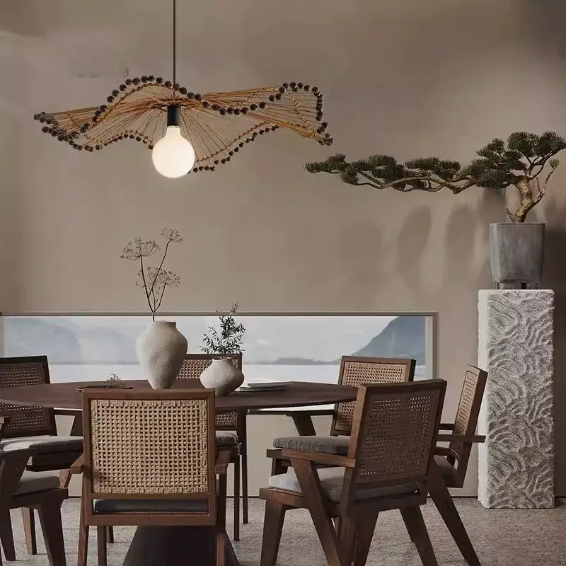 Elegant Wabi-sabi sculptural drop light, stylish choice for dining table pendant lighting.