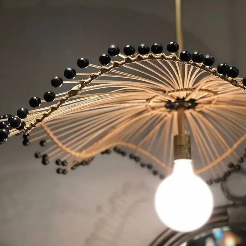 Hand-assembled sculptural pendant lamp, natural finish for healthy, sustainable living.