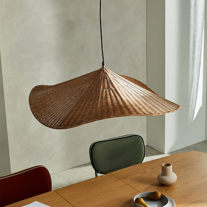 Organic botanical wicker and glass globe light, enhancing healthy indoor climate with natural materials.