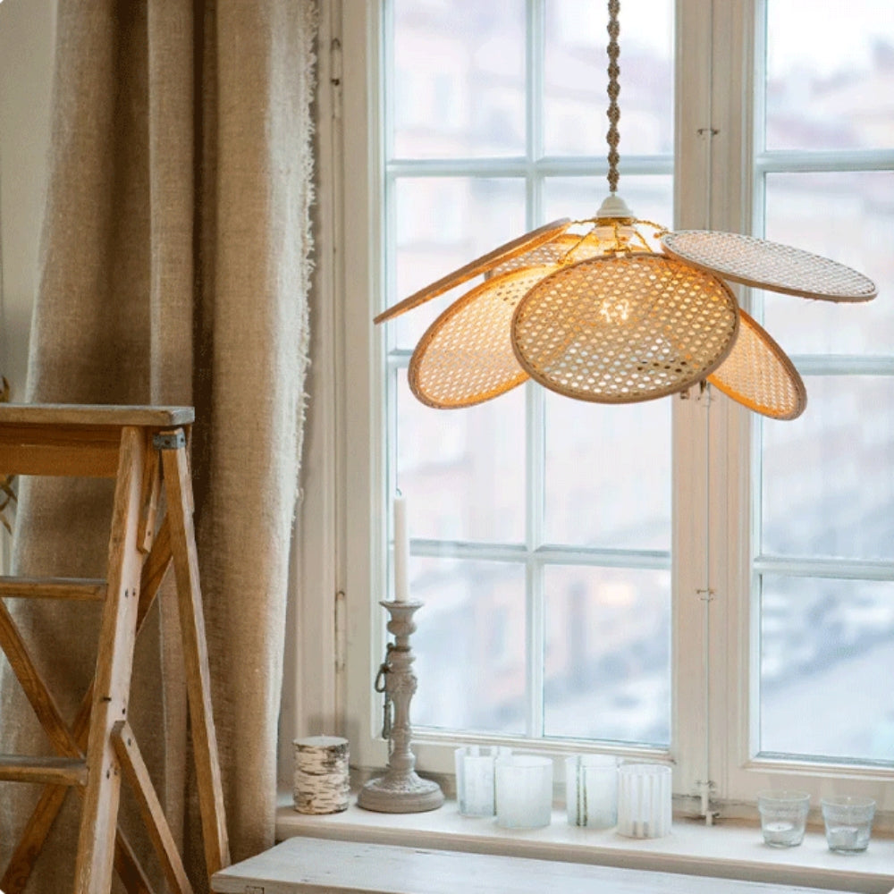 Organic rattan blossom ceiling pendant light that serves as a stunning minimalist statement piece in any interior.