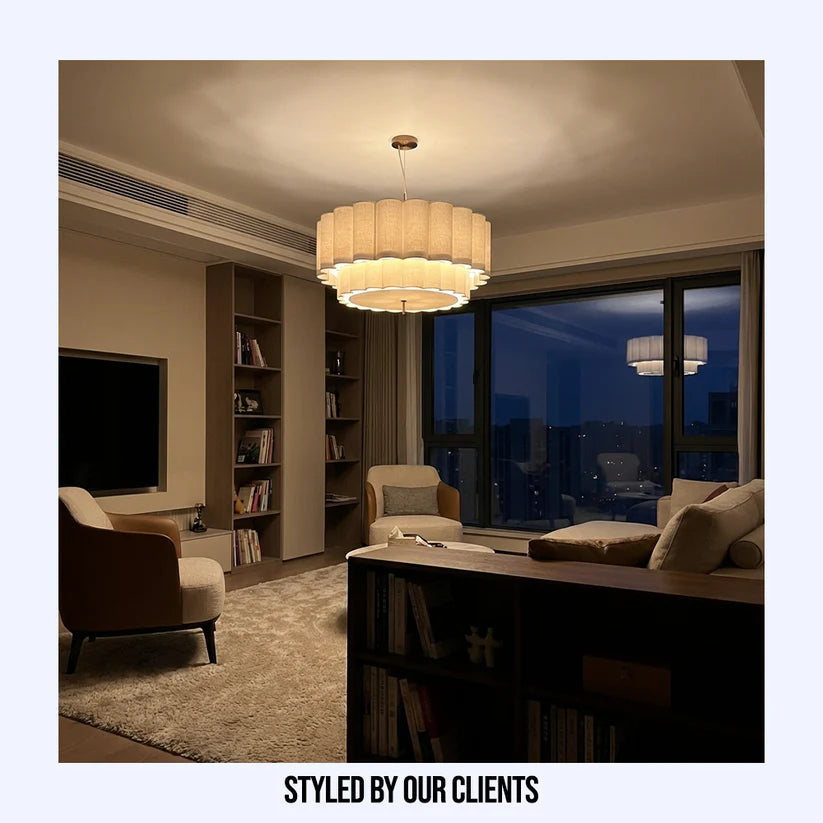 Pendant light featuring a handmade eco-friendly fabric design, perfect for a natural living room, providing ambient mood lighting.
