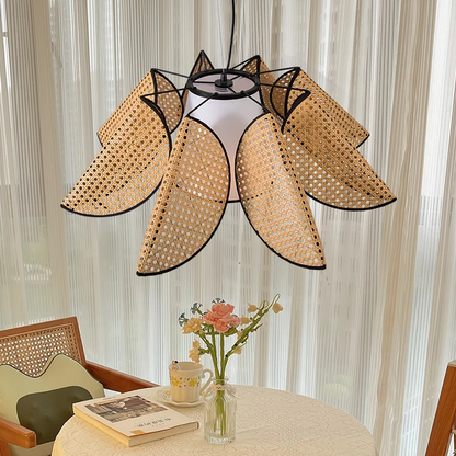 Pendant light featuring a handmade eco-friendly rattan and fabric design, perfect for a natural living room, providing ambient mood lighting.