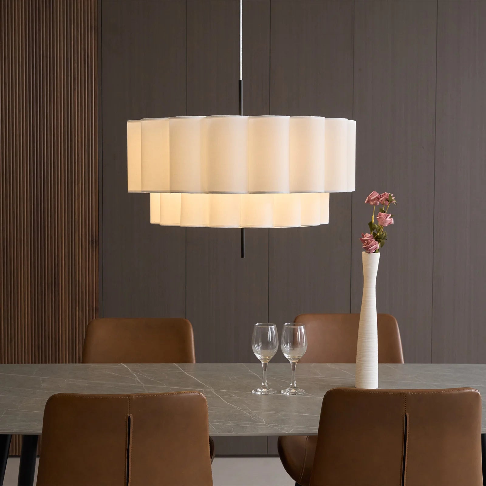 Pendant light made from natural fabric, perfect over dining tables, providing pleasant lighting for family meals.