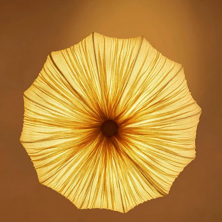 Pendant light with Organic modern aesthetic, made from Textile, ideal Entryway lamp for ambient and task lighting.