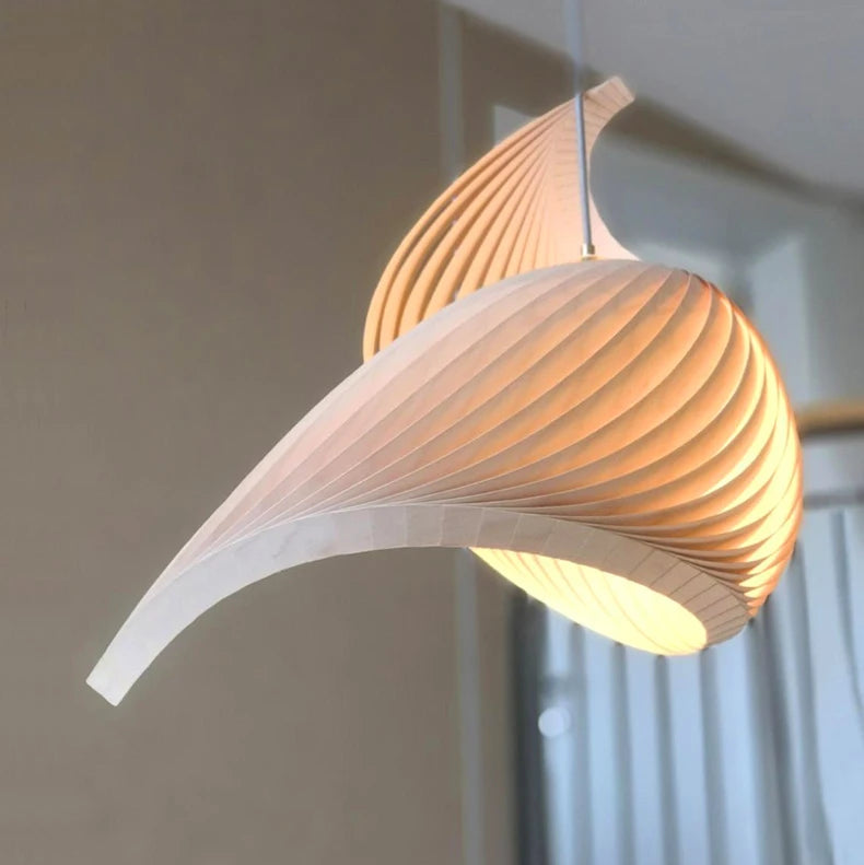 Pendant light in Organic modern style, using wood, providing clean lines and soft ambient lighting for modern rooms.