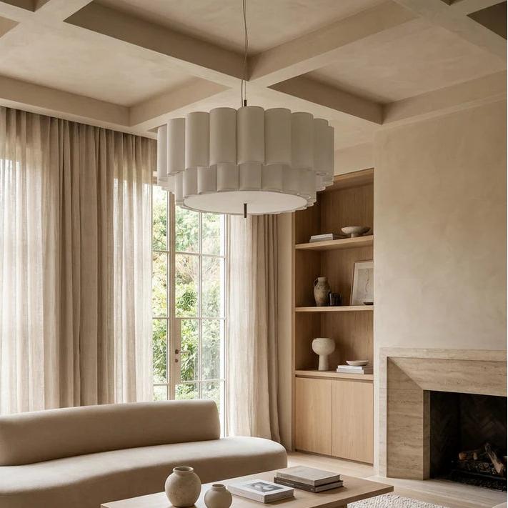 Pendant light in Scandinavian style, crafted from fabric, ideal for modern interiors, providing warm ambient lighting.