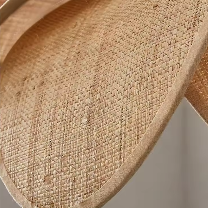 Pendant light in Scandinavian style, crafted from Rattan, ideal for modern interiors, providing warm ambient lighting.