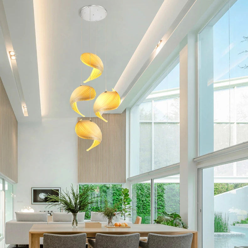 Pendant light in Scandinavian style, made with wood, providing sculptural lighting for contemporary interiors.