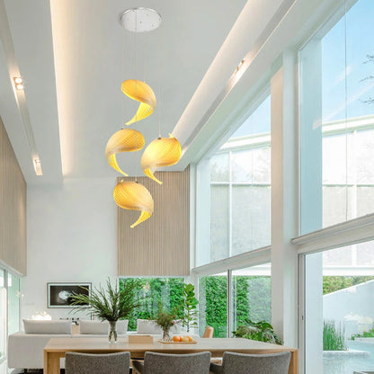 Pendant light in Scandinavian style, made with wood, providing sculptural lighting for contemporary interiors.