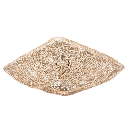 Hand-twisted pure rattan ceiling fixture, an example of zero-waste, eco-friendly home decor.