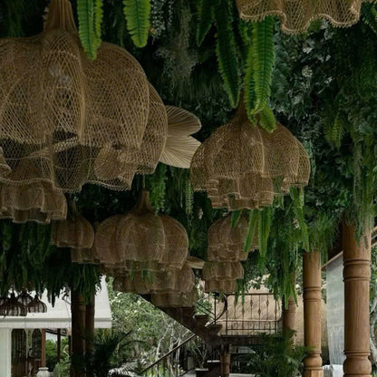 Statement  rattan pendant light creating a cozy, artistic ambiance for modern cafe interiors
