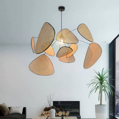Large rattan screen chandelier featuring multiple woven cane leaf panels arranged around a central light bulb