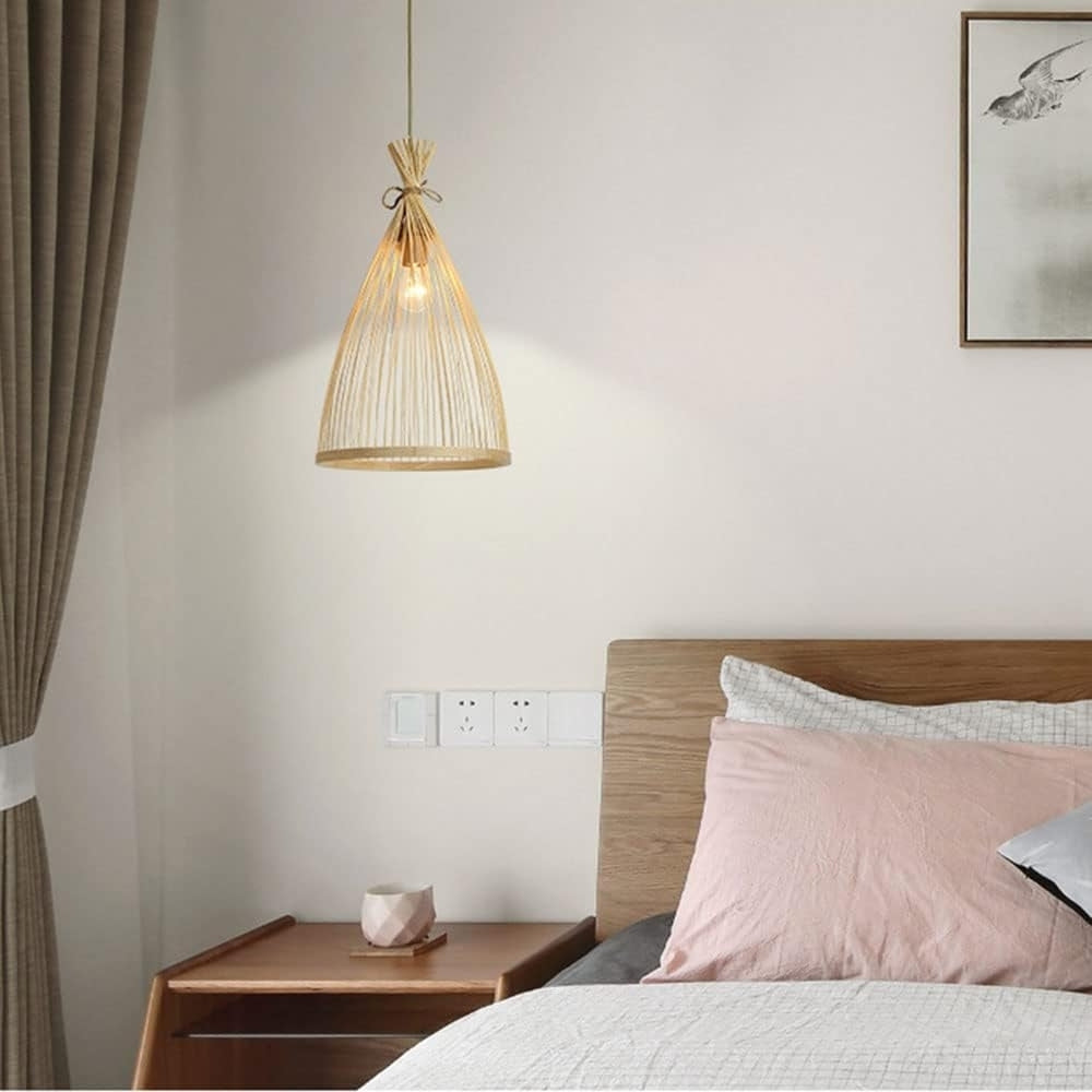 Rustic bamboo pendant light features handwoven design and soft warm glow