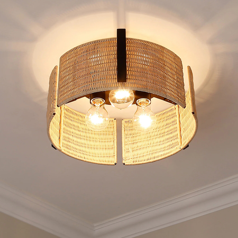 Rustic boho rattan cage light, a trendy design piece for an eclectic and warm home interior.
