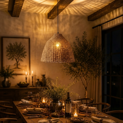 Large rustic jute woven pendant light hanging above a minimalist dining table.