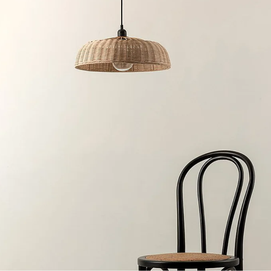 Rustic wicker ceiling pendant fixture with soft glowing light