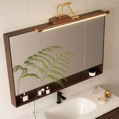 Scandinavian style wood mirror sconce providing natural task lighting for bathroom vanity