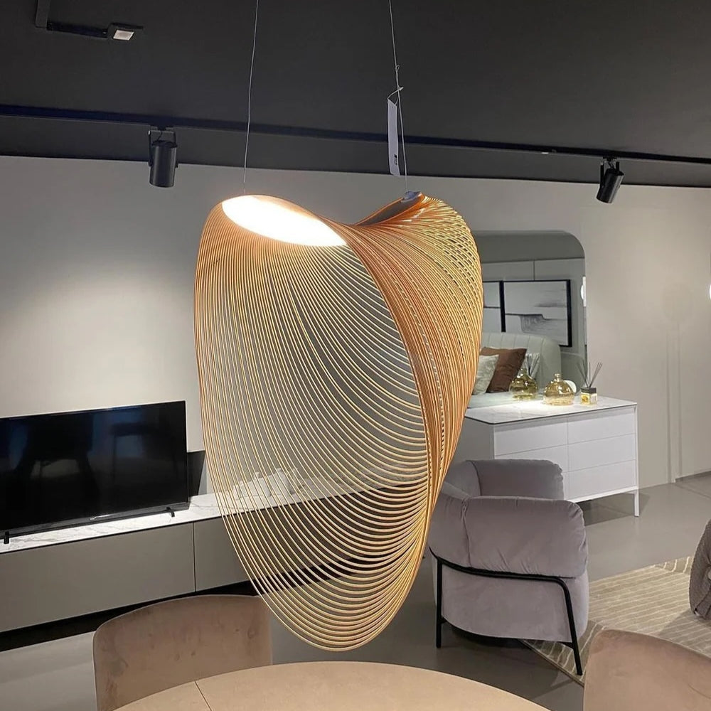 Unique sculptural spiral hanging lamp creating a dramatic visual effect