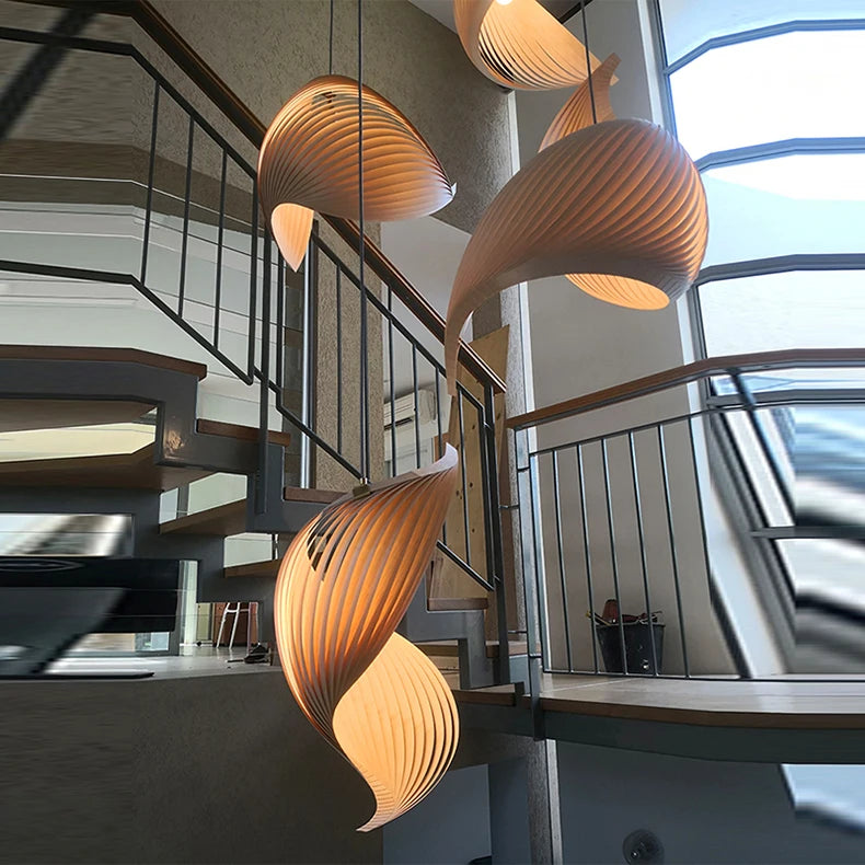 Sculptural lighting in organic wood, designed for a resort-style vibe, creating a serene and natural ambiance.