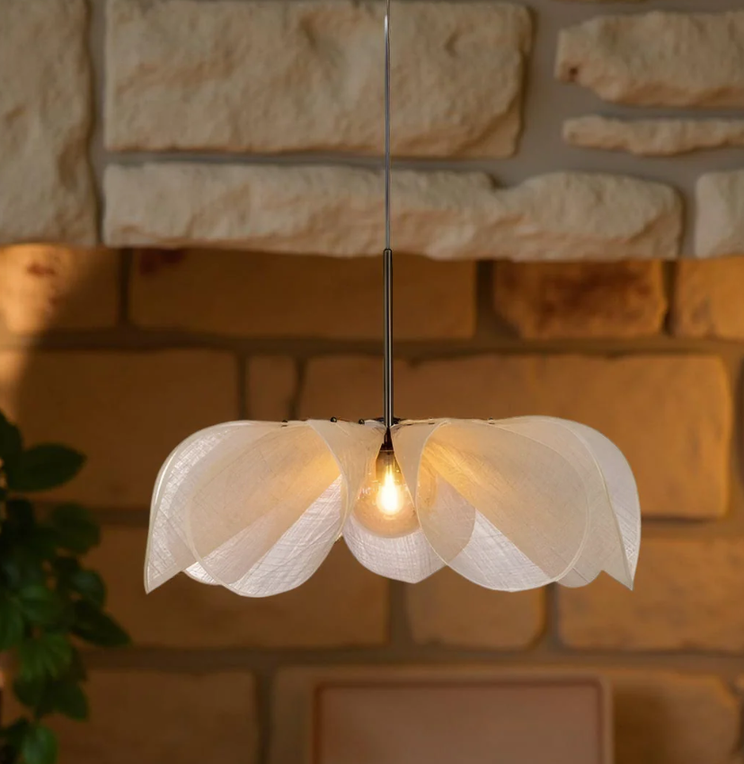 Sculptural lighting in Quiet Luxury style, crafted from Fabric, ideal for Cozy Home decor, providing ambient and mood lighting with an organic, sculptural appeal.