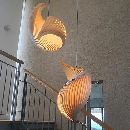 Sculptural lighting in quiet luxury style, crafted from premium wood, ideal for a cozy home, offering refined mood lighting.