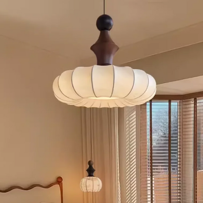 Sculptural lighting in Quiet luxury style, featuring Wood Mix Cloth material, ideal for Design decor, providing ambient and task lighting.