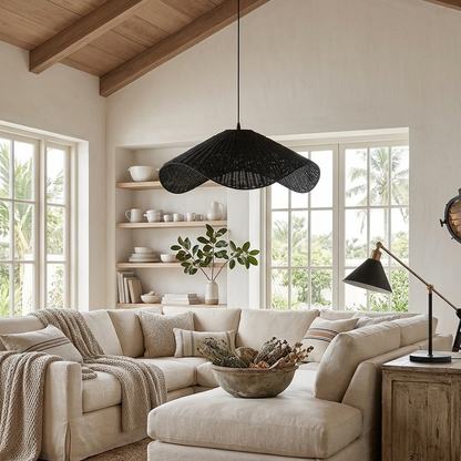 Statement black woven living room light creating dramatic shadow patterns on walls
