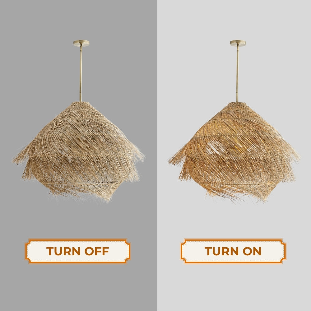 Umbrella-shaped straw pendant shade with layered wild grass fringes hanging on a sleek metallic stem.