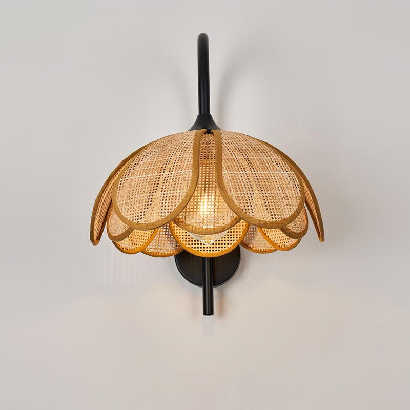 Sustainable handmade rattan flower wall light crafted from organic materials for entryway