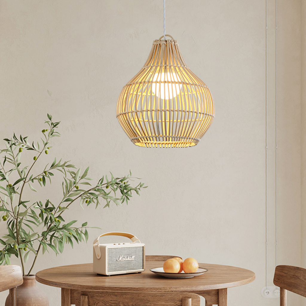 Eco-friendly rattan basket pendant light illuminating a dining space