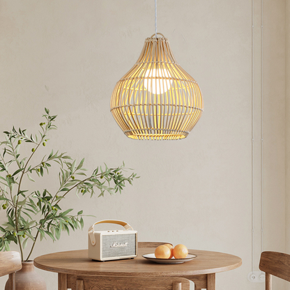 Eco-friendly rattan basket pendant light illuminating a dining space
