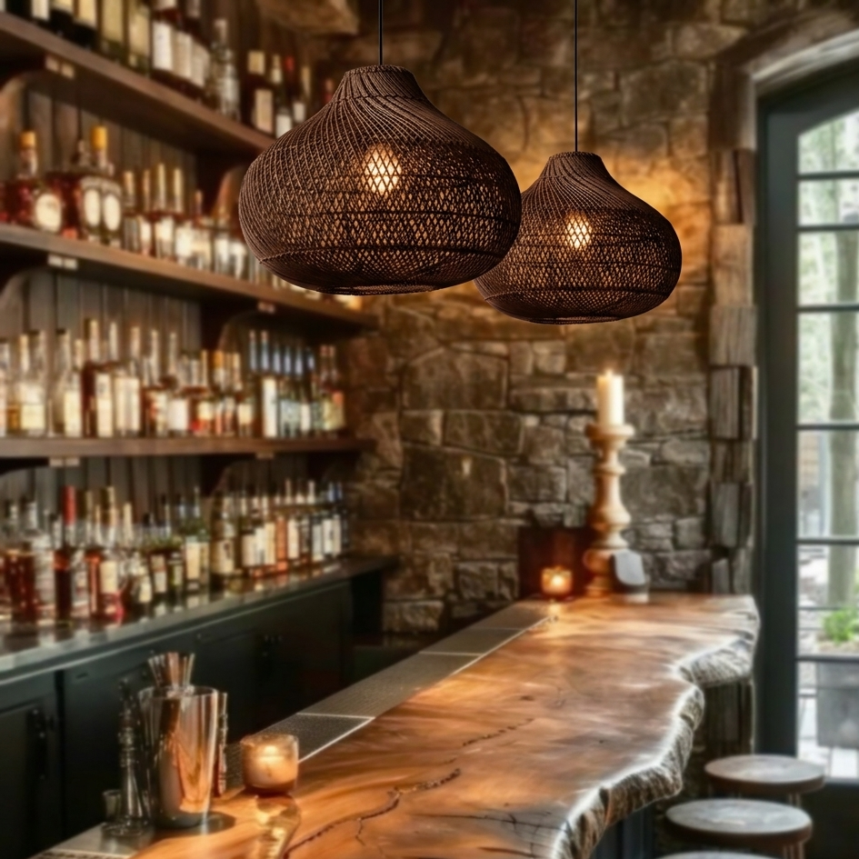 Textured rattan pendant light creating a cozy, moody, and sophisticated atmosphere in a wine cellar.
