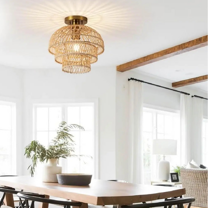 Tiered rattan ceiling light perfectly placed over a kitchen island to create a natural, bright dining mood.