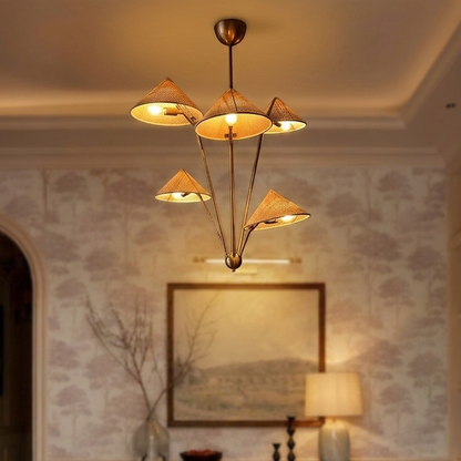 Multi-cone brass chandelier making a statement in a modern entryway