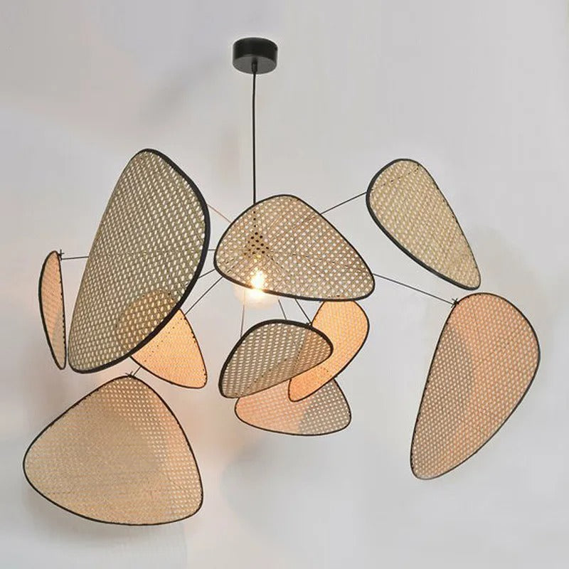 Wabi-Sabi organic rattan pendant light featuring raw-edged woven cane screens and a minimalist black canopy