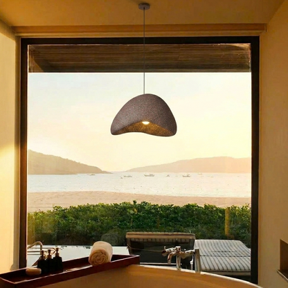 Organic pebble-shaped pendant light for luxury resort villa interiors