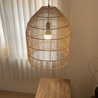 Wabi-sabi style woven rattan hanging light, embodying the beauty of imperfection for a serene home.