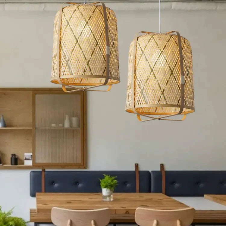 Artistic sculptural bamboo lamp, captures wabi-sabi beauty for unique interiors, cylinder form.