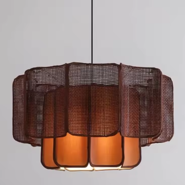 Artistic sculptural rattan lamp, captures wabi-sabi beauty for unique interiors, tiered form.