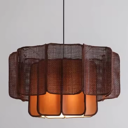 Artistic sculptural rattan lamp, captures wabi-sabi beauty for unique interiors, tiered form.