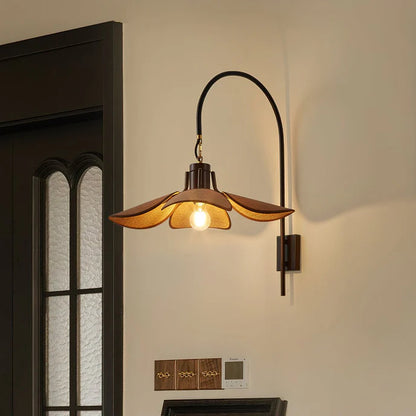 Spa resort mood lighting featuring a relaxing wood and fabric flower pendant